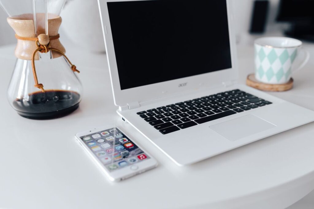 Workplace with laptop on table at home Stock Free