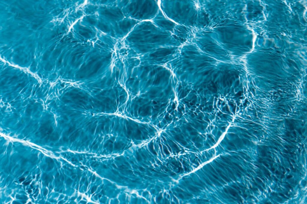 Wavy water surface in a swimming pool Stock Free