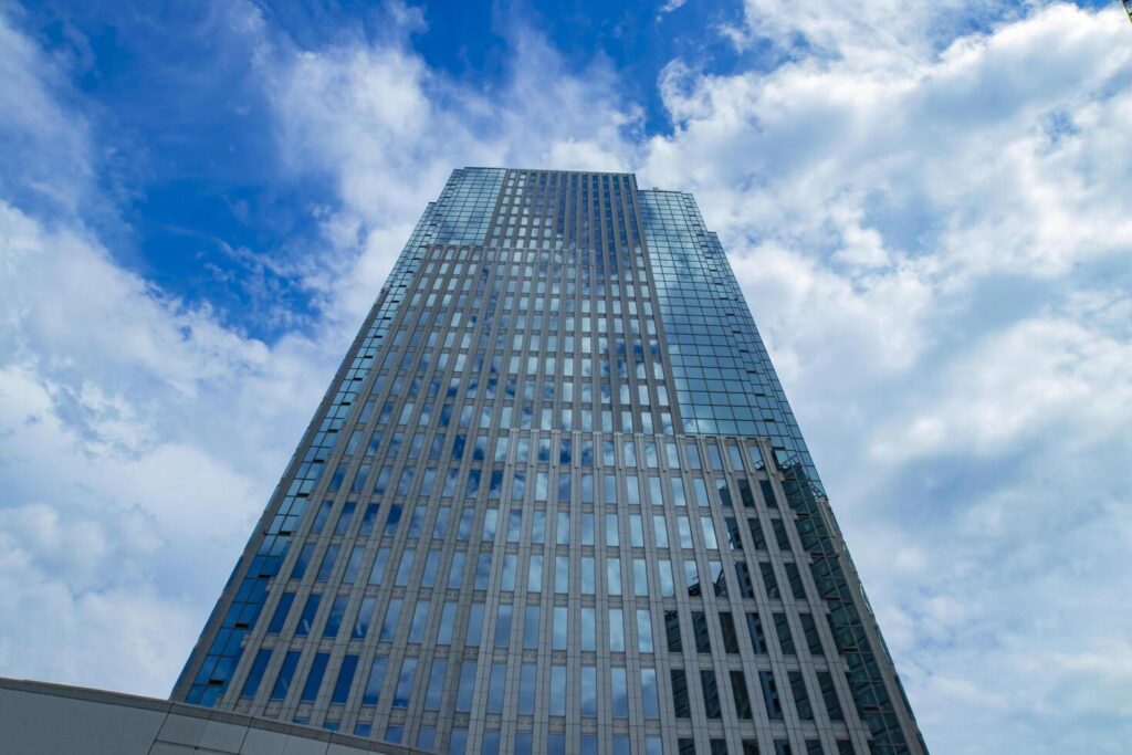 A cloud reflecting the building in the business town wide shot Stock Free