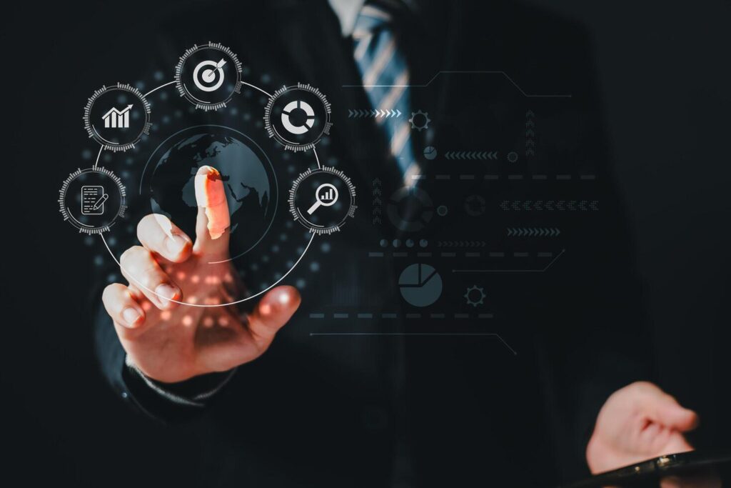 
									A person touch world and using a smartphone to plan in e-business, the use of online digital network technology in business, buying and selling commerce online digital marketplace Stock Free