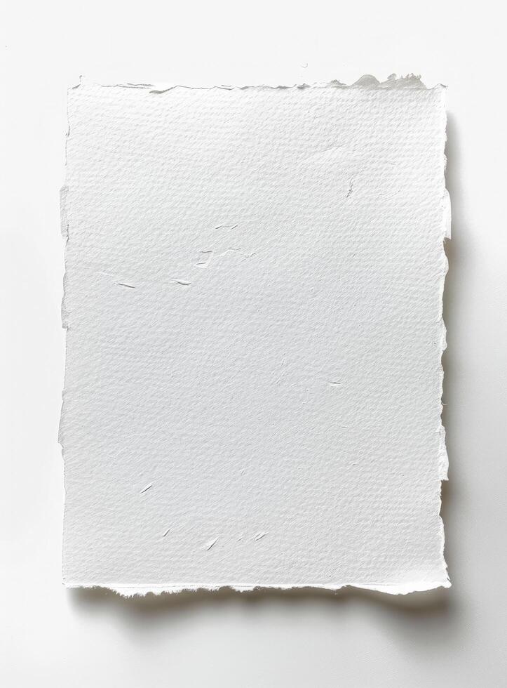 a white piece of paper with the texture of cotton on white background Stock Free