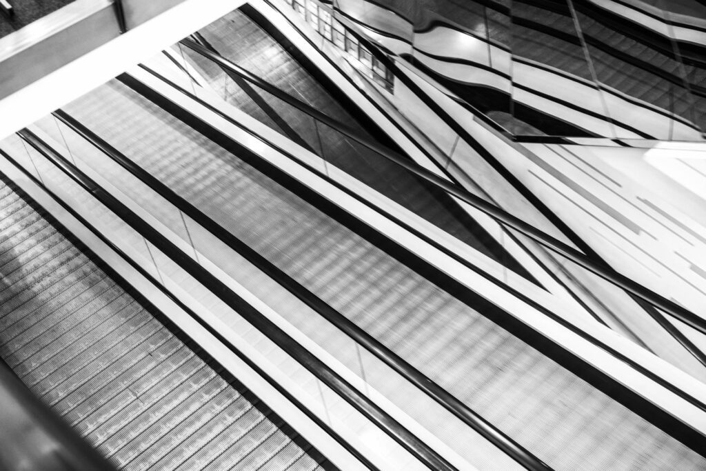 Abstract Black and White Geometric Background (Escalators) Free Photo