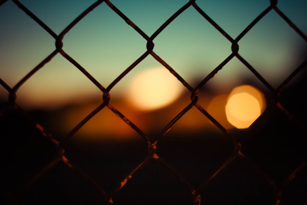 Abstract Bokeh Through a Fence Free Photo