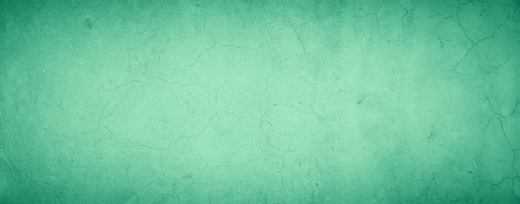 abstract grungy concrete wall texture background with green pastel color Stock Free