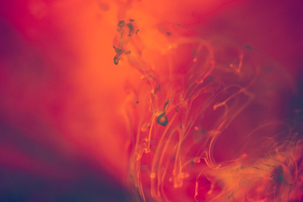 Abstract Red and Orange Liquid Background Free Photo