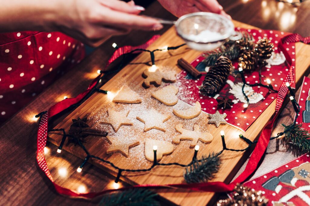 Adding Sugar on Christmas Cookies Free Photo