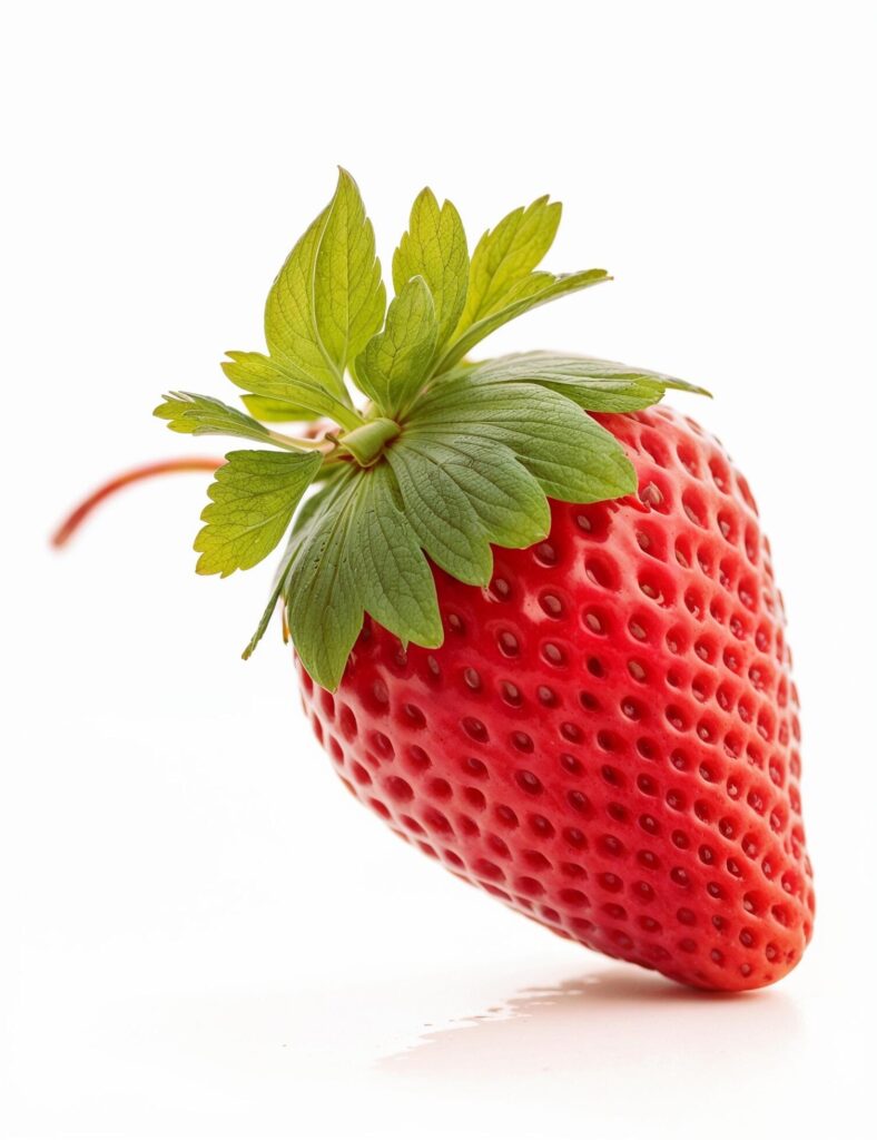 a strawberry is shown on a white background Free Photo