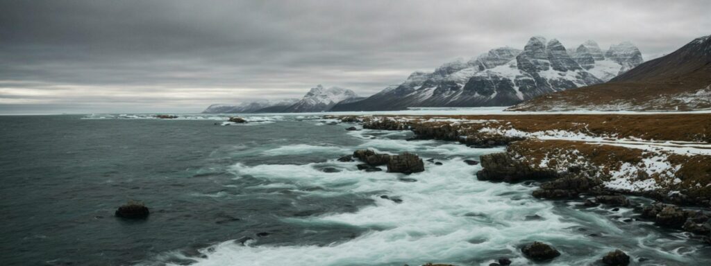 banner winter nature the meeting point of icy waters and snowy landscapes let the panorama tell a story of nature’s resilience in the face of the cold. Free Photo