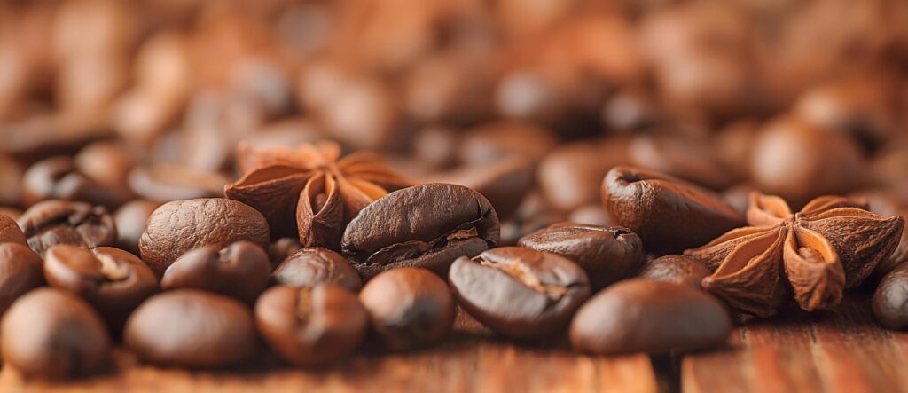 coffee beans and star anise on a wooden table Free Photo