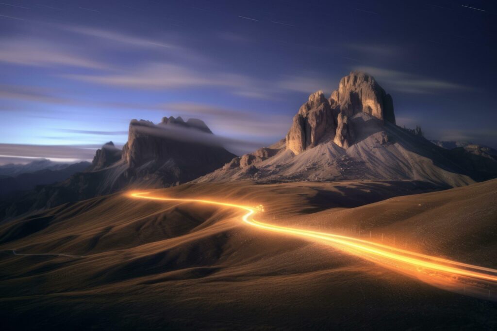 Light trails of car over the night mountain Free Photo