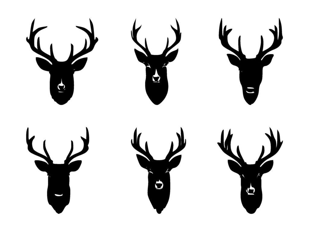 set of deer head silhouettes on isolated background Free Vector