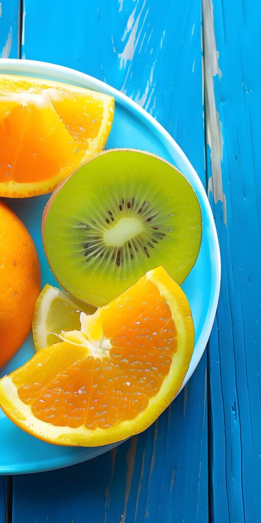 Vibrant and Fresh Fruit Slices on a Plate Free Photo