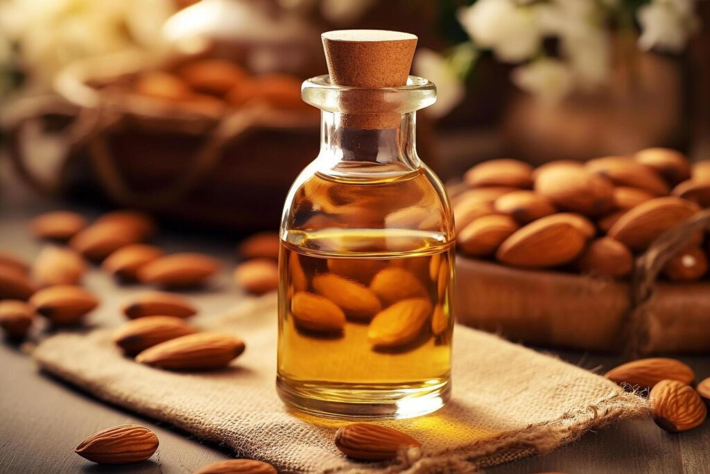 Almond oil with almond on the table background.. Stock Free