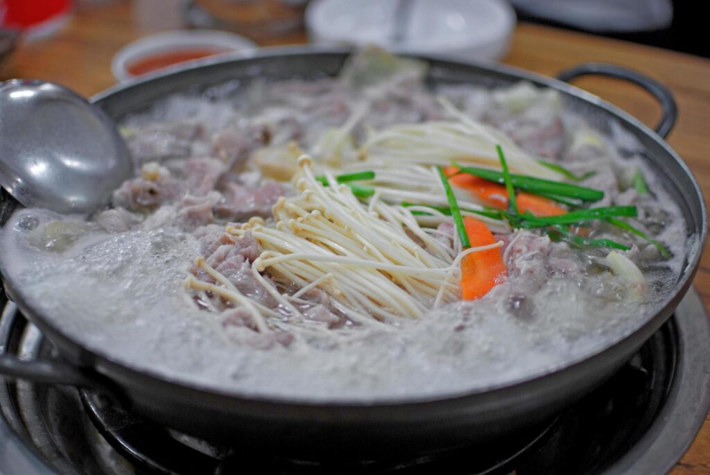 Asian traditional hot pot for part with friend or family meal. Poppular food in asian country. selective focus background Stock Free