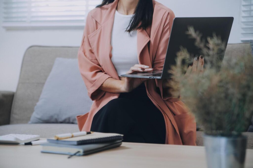 Asian woman working laptop. Business woman busy working on laptop computer at office. Stock Free