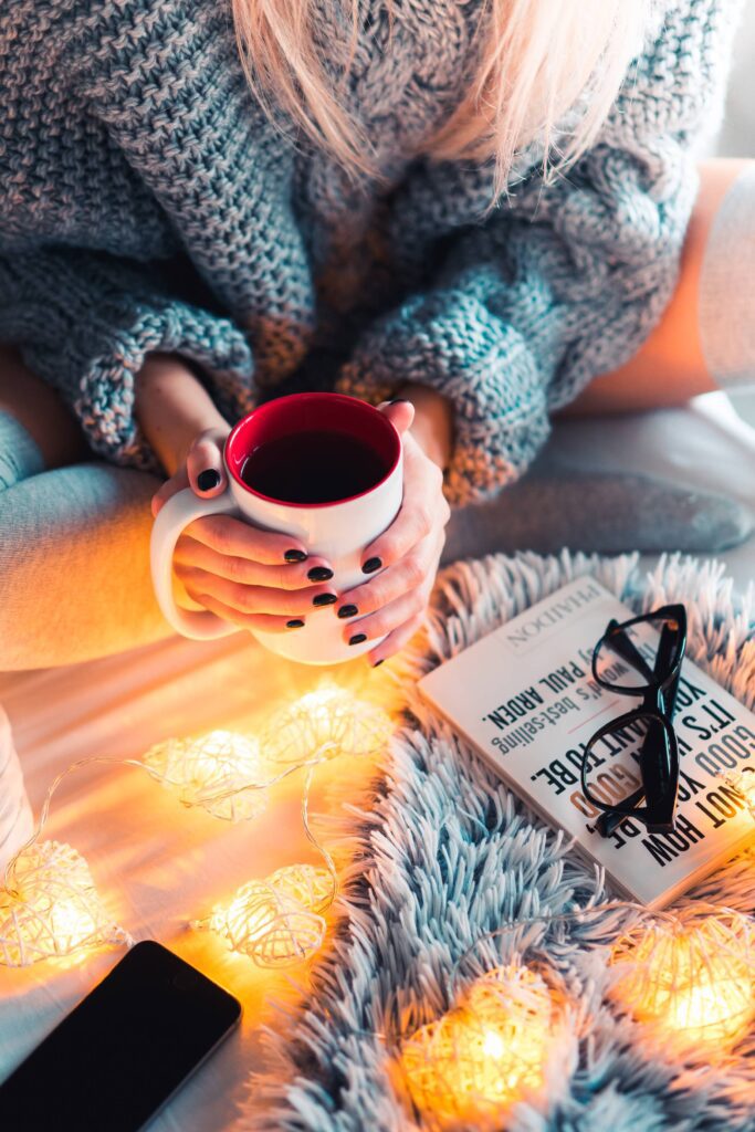 Autumn Mood with Hot Tea in Bed Free Photo