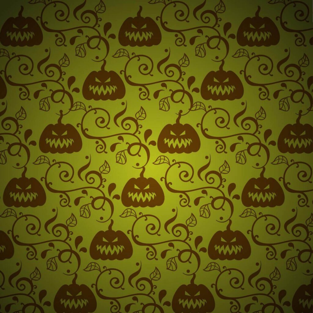 Pumpkin with leaves on green background