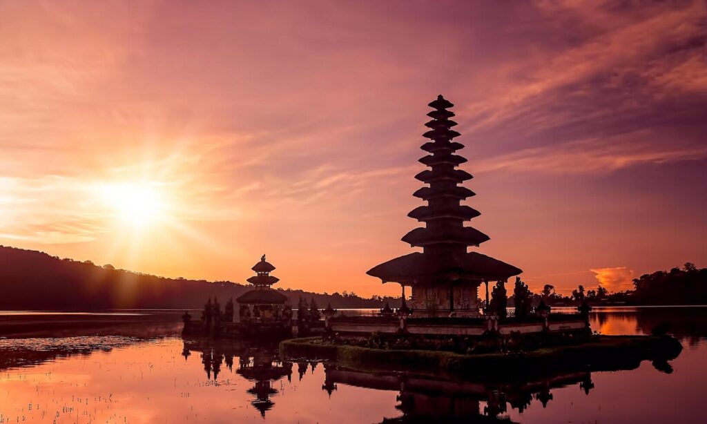 background of the silence of Nyepi day with the temple at sunset Stock Free