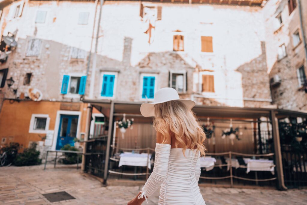 Beautiful Lady Wandering Through Streets of Croatian City Free Photo