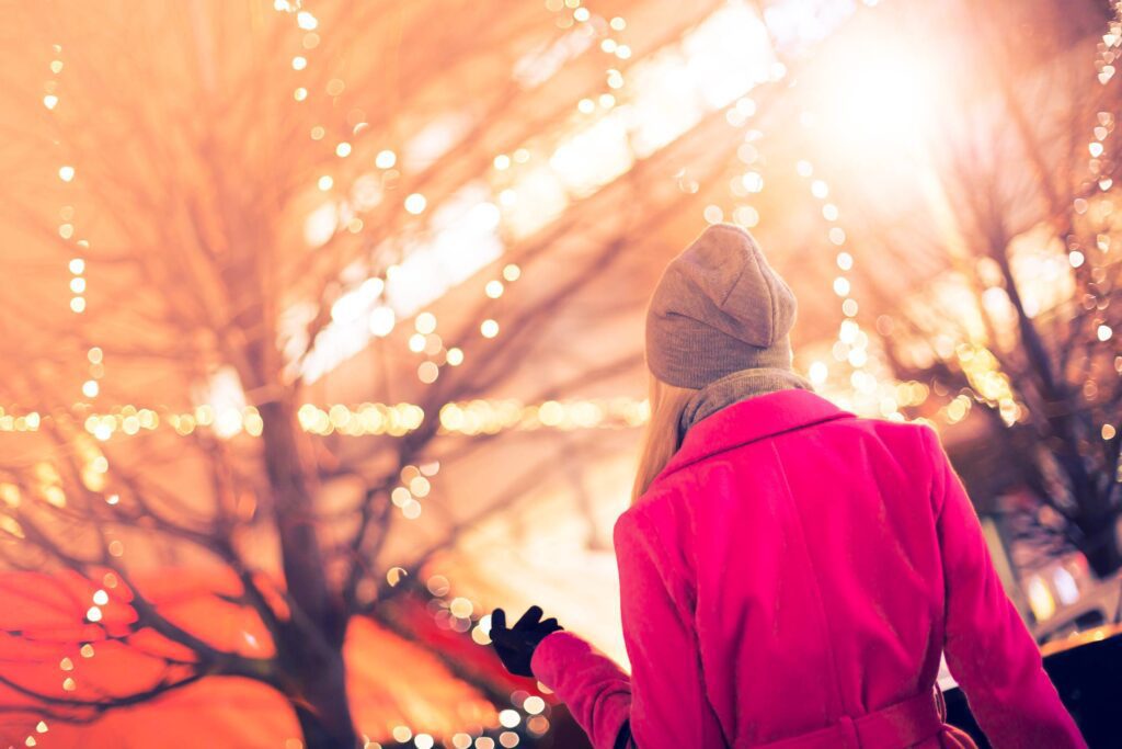 Beautiful Woman at Christmas Market Free Photo