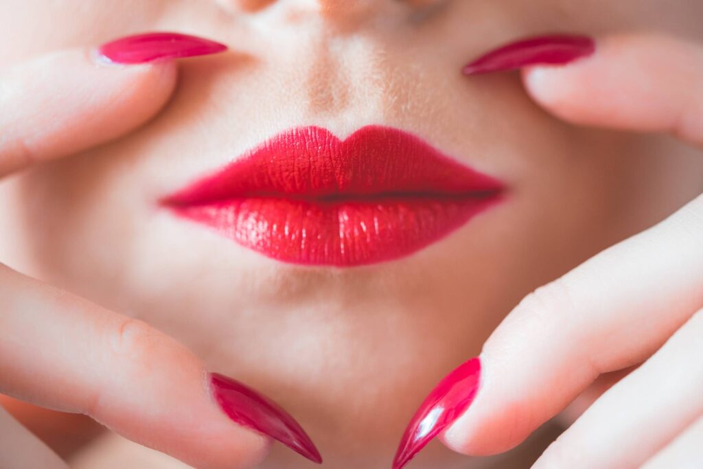 Beauty Perfect Red Lips and Nail Design Free Photo