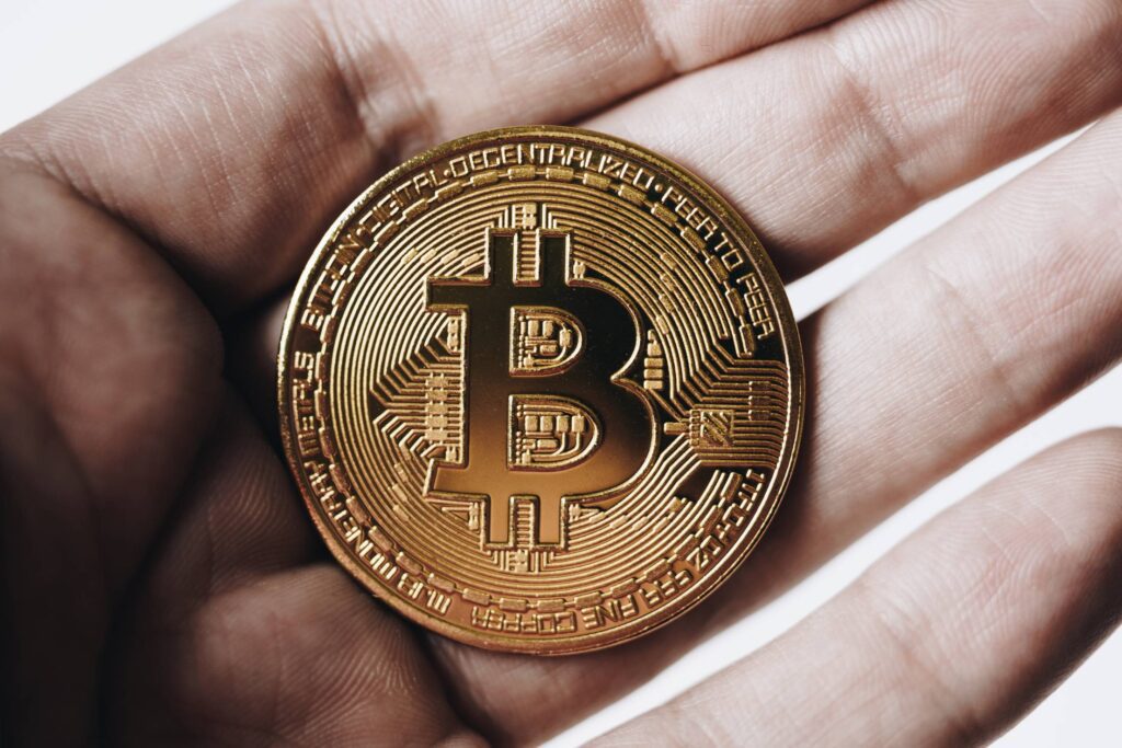 Bitcoin in Hand Free Photo