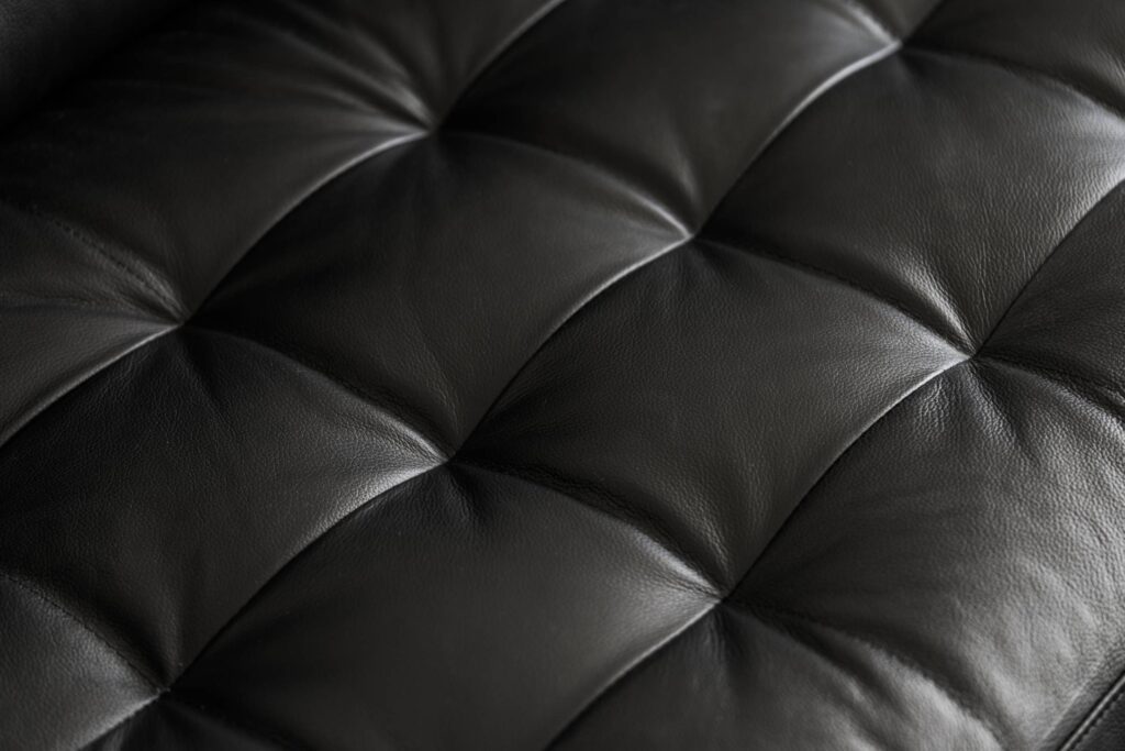 Black Leather Seat Sofa Minimalistic Background Free Photo