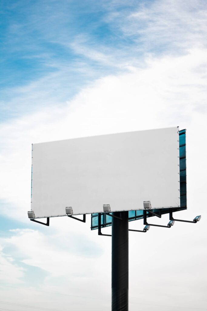 Blank Billboard For Advertising With Cloudy Sky Background Free Photo