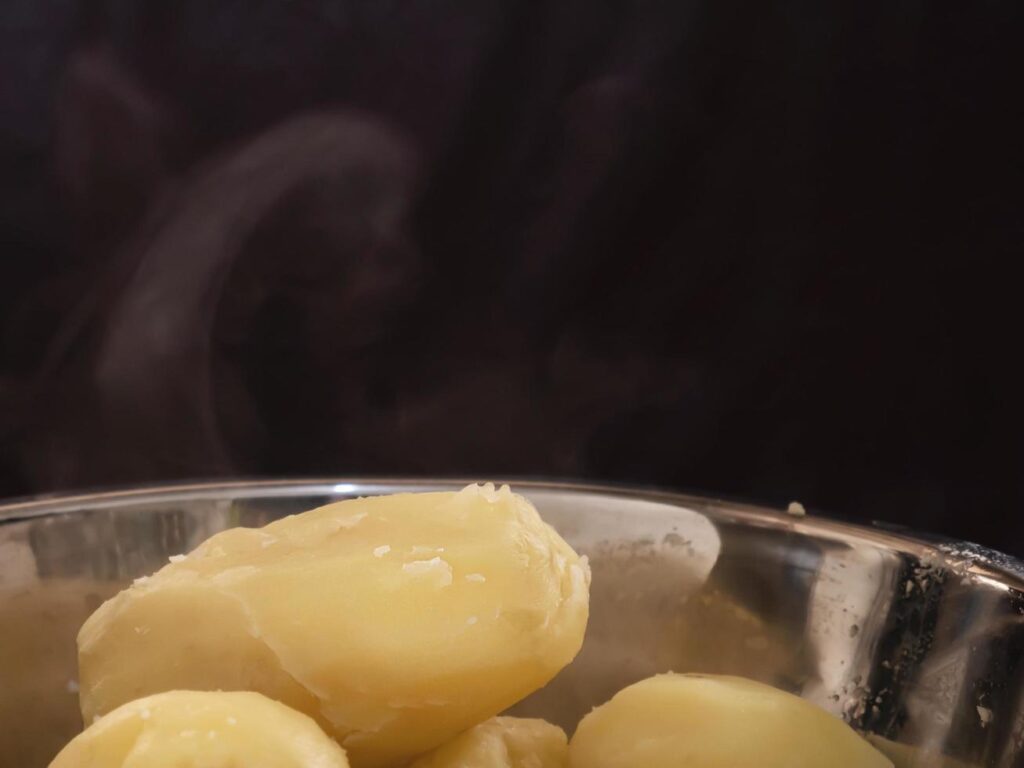 Boiled potato prepare to making food – potato cooking background concept Stock Free