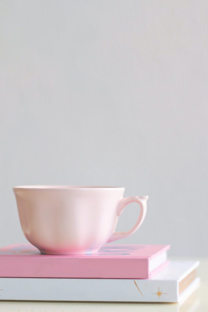 Books and a Vintage Cup Free Photo