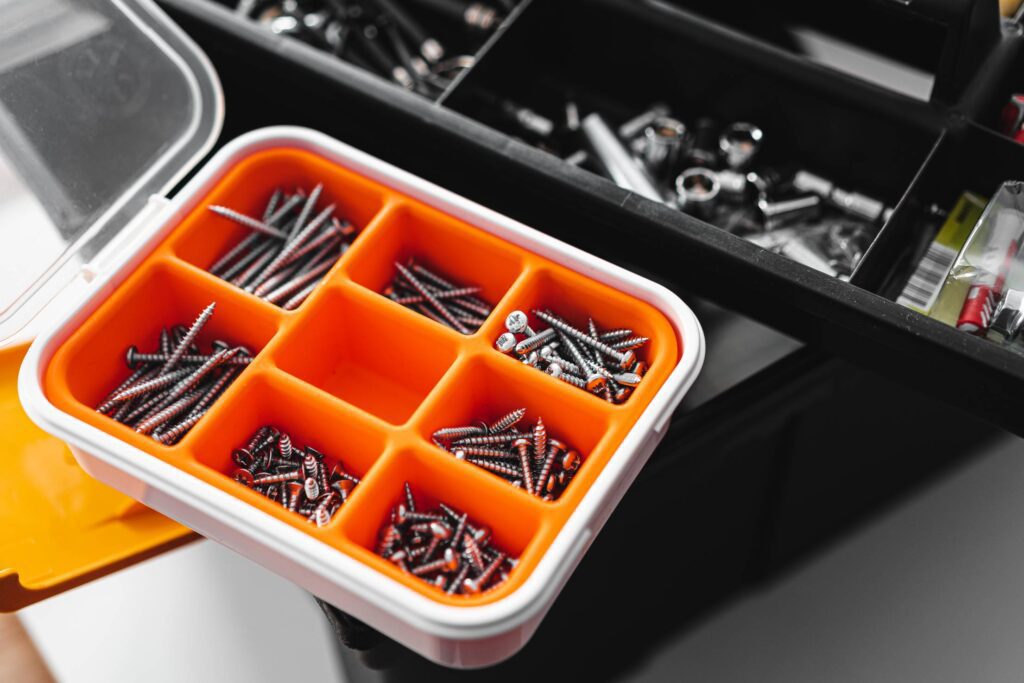 Box with Screws of Different Sizes Free Photo