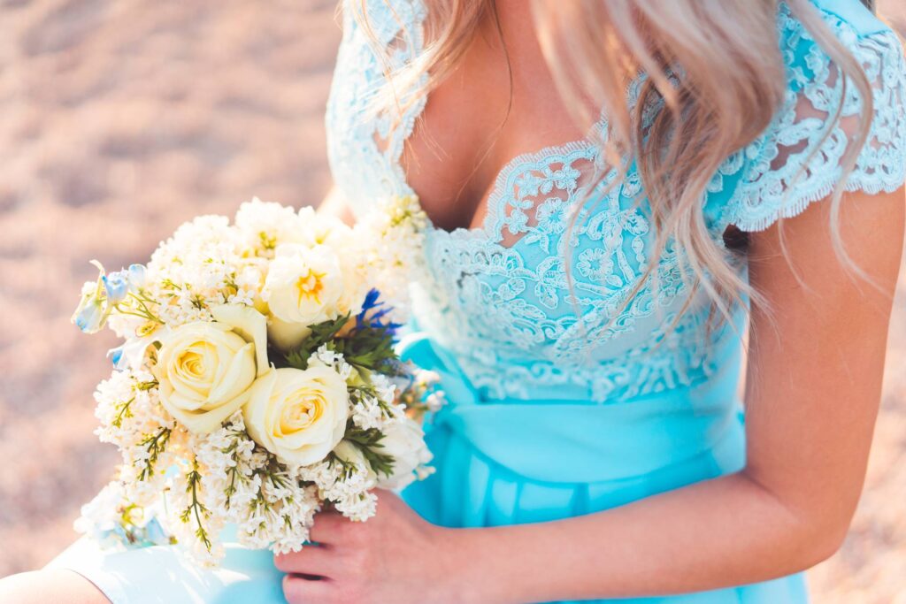 Bridesmaid with Beautiful Flower Free Photo