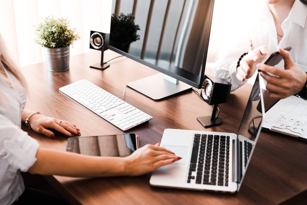 Business Brainstorming Between Man and Woman in the Office Free Photo