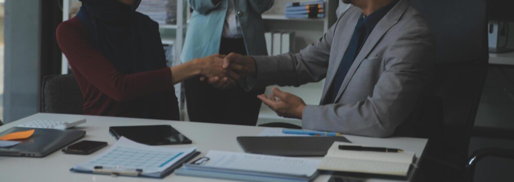 Business people shaking hands after meeting. colleagues handshaking after conference. Greeting deal, teamwork partnership cooperate concept. Stock Free