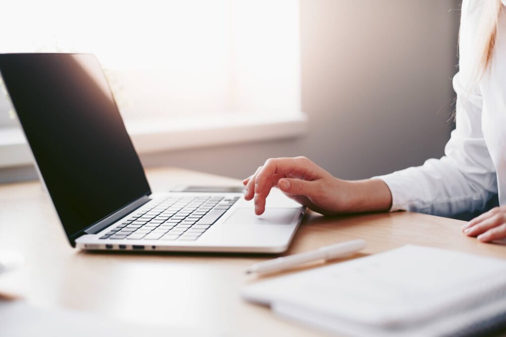 Business Woman Working on Laptop in Her Office Free Photo