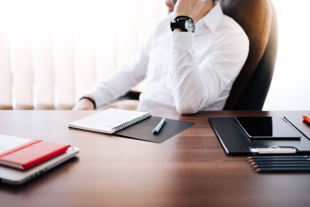 Businessman CEO Making a Phone Call in Office Free Photo