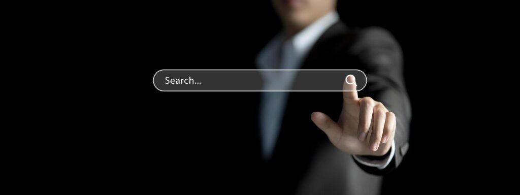 Businessman hand searching information on internet, Data search engine Optimization concept. Man’s finger browsing internet connecting worldwide Stock Free