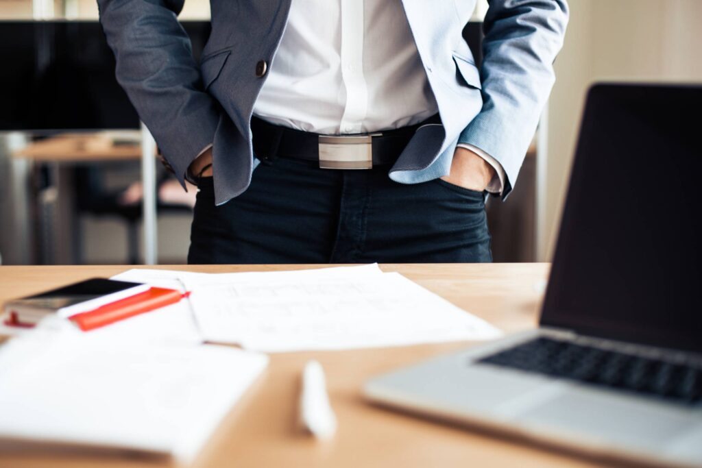 Businessman Standing in his Office Free Photo