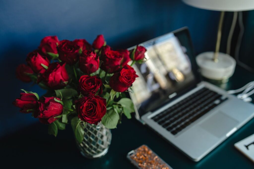 Office Desk Table With Red Roses Stock Free