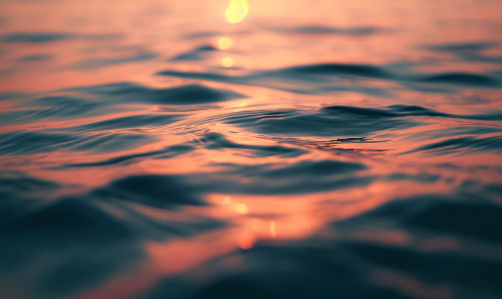 Calm Water Surface at Sunset Stock Free