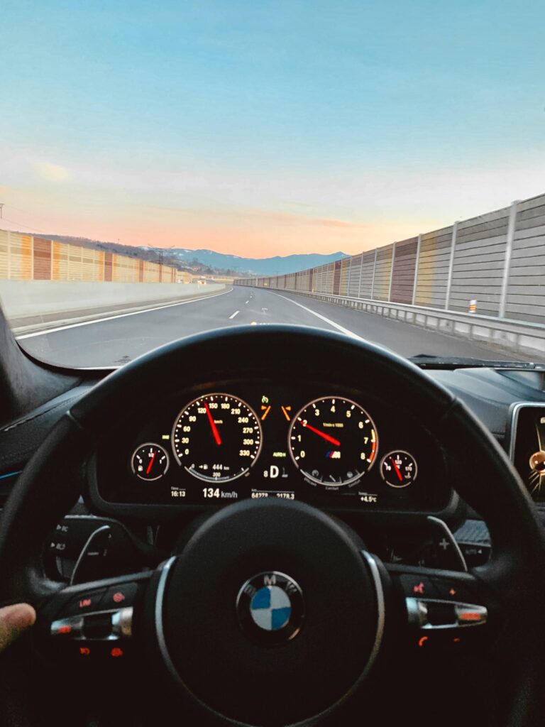 Car Cockpit View on Highway Free Photo