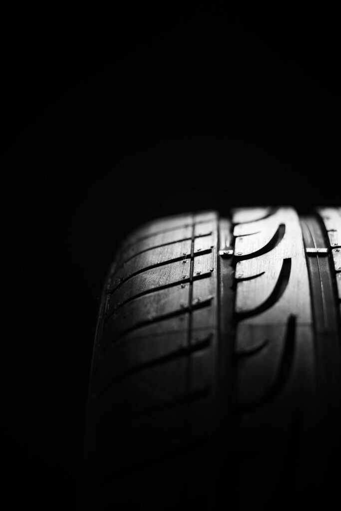 Car Tire Tread Pattern Close Up Vertical Free Photo