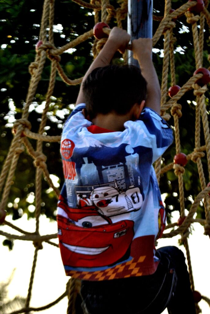 Child Climbing Ropes Park Stock Free