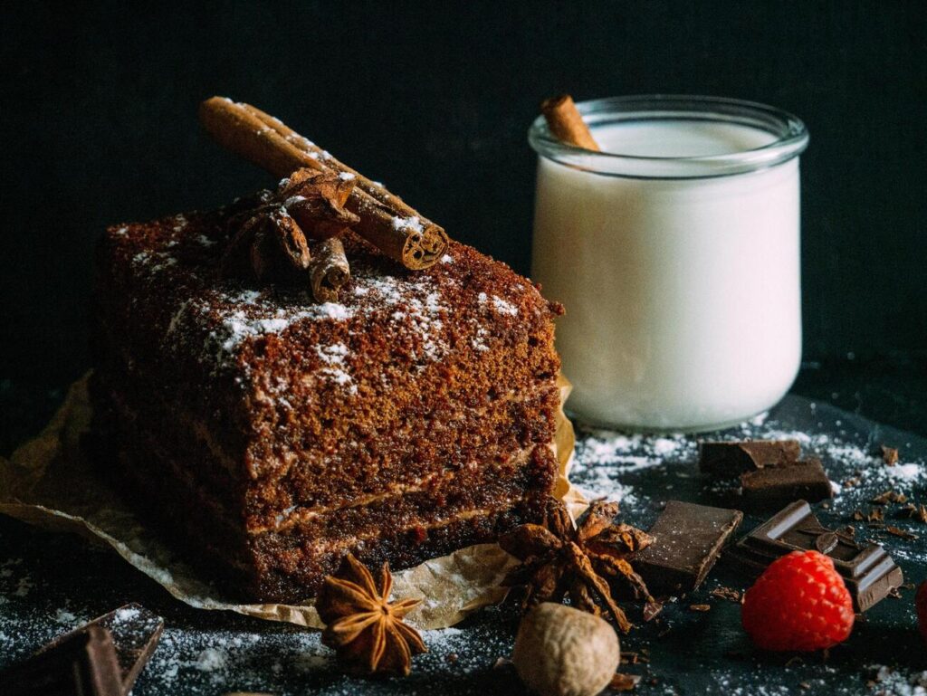 chocolate cake with cinnamon and spices on a dark background Stock Free