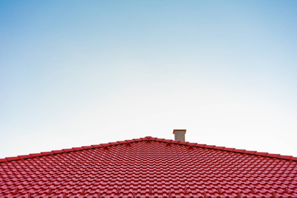 Classic European Red Roof with Chimney Free Photo