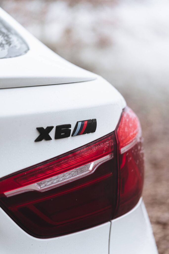 Close Up of the Rear BMW X6M Black Logo Free Photo