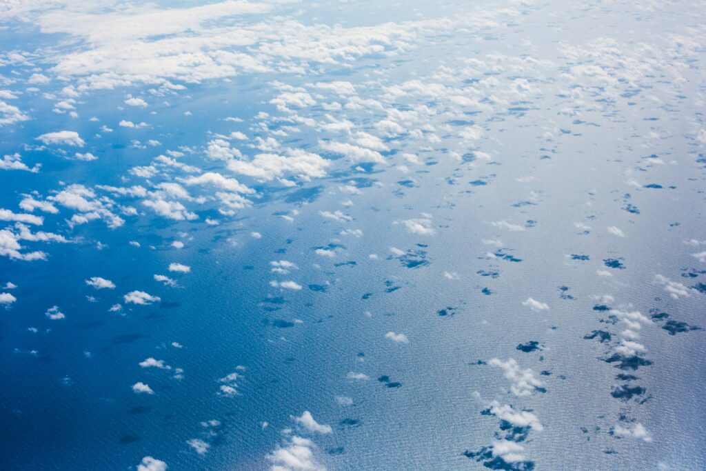 Clouds over the Pacific Ocean from an Airplane Free Photo