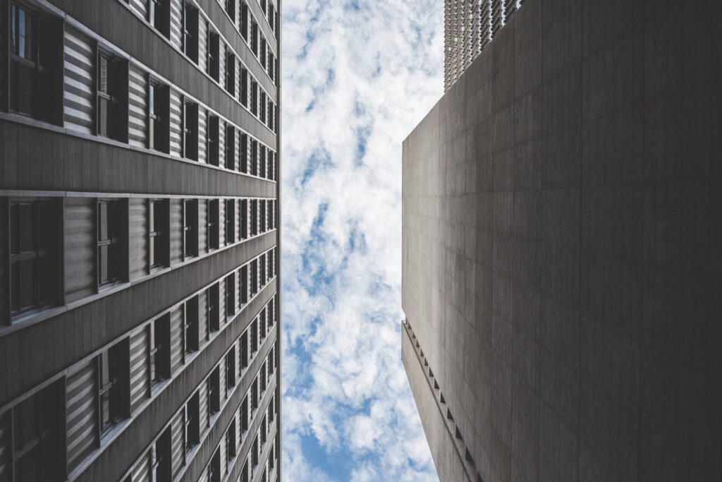 Cloudy Sky Between Two Skyscrapers Buildings Free Photo