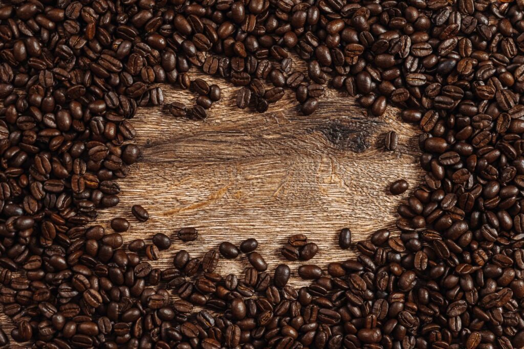 Coffee Beans Background with Place for Text Free Photo