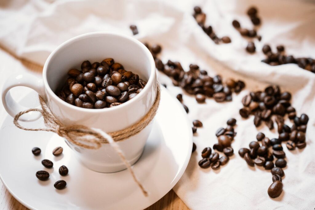 Coffee Cup and Beans Still Life Free Photo